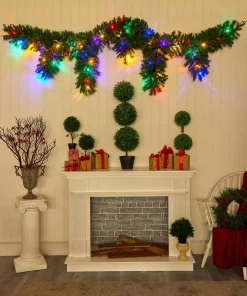 Christmas Greenery Nearly Natural 9 Ft. X 12 In. Hanging Icicle Artificial Christmas Garland With 50 Multi-Colored LED Lights, Berries And Pine Cones -Christmas Tree Decorations Shop nearly natural christmas garland 4458 44 1000