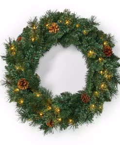 Christmas Greenery Noble House 24 In. Green Battery Operated Pre-Lit Warm White LED Mixed Pine Artificial Christmas Wreath With Pine Cones